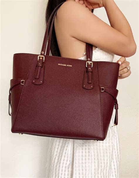 michael kors black voyager tote|michael kors voyager tote merlot.